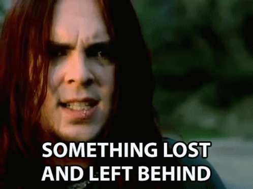 A Man With Long Red Hair And A Piercing In His Lip Is Talking About Something Lost And Left Behind . GIF