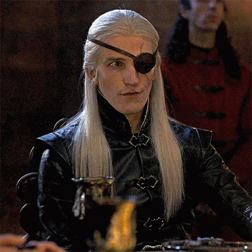 A Man With Long White Hair And A Eye Patch GIF