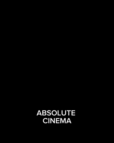 A Man With Long White Hair Is Sitting In A Chair With His Hands In The Air And The Words Absolute Cinema Above Him GIF