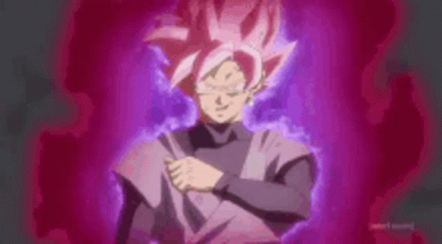 A Man With Pink Hair And A Black Shirt Is Standing In Front Of A Pink Background . GIF