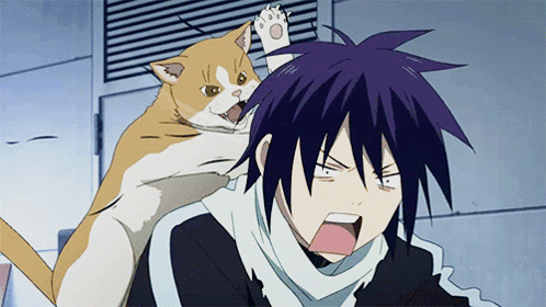 A Man With Purple Hair Is Being Attacked By An Orange Cat GIF