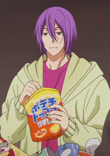 A Man With Purple Hair Is Holding A Bag Of Chips With Chinese Writing On It GIF