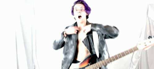 A Man With Purple Hair Is Holding A Guitar GIF