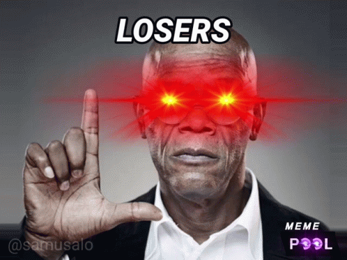 A Man With Red Eyes And The Words Losers Written On His Face GIF