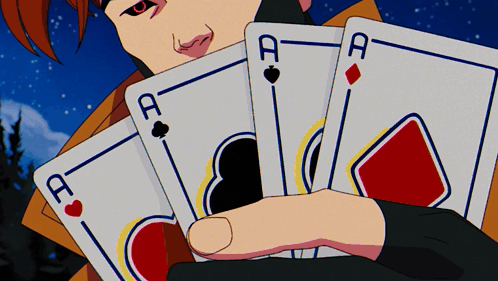 A Man With Red Eyes Is Holding Four Aces Playing Cards GIF