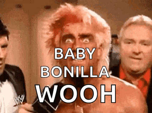 a man with red hair and the words baby bonilla wooh written on his face