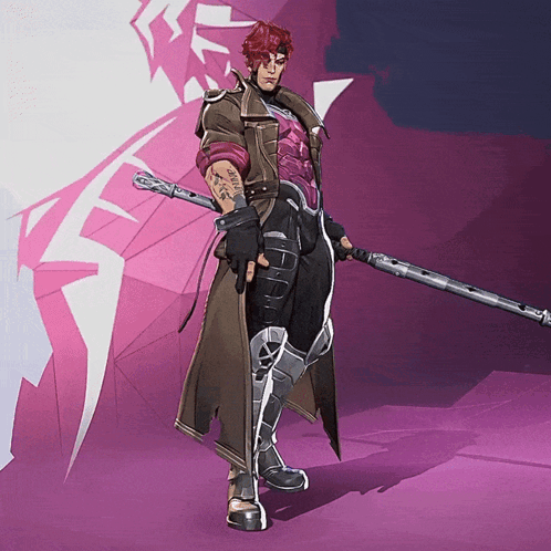 A Man With Red Hair Is Holding A Sword GIF