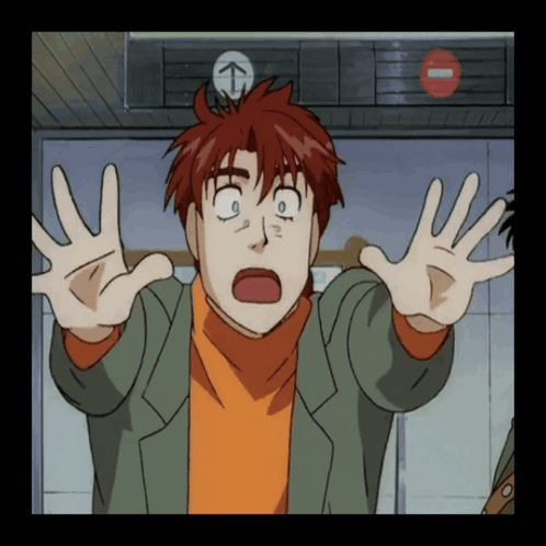 A Man With Red Hair Is Making A Funny Face In Front Of An Elevator GIF