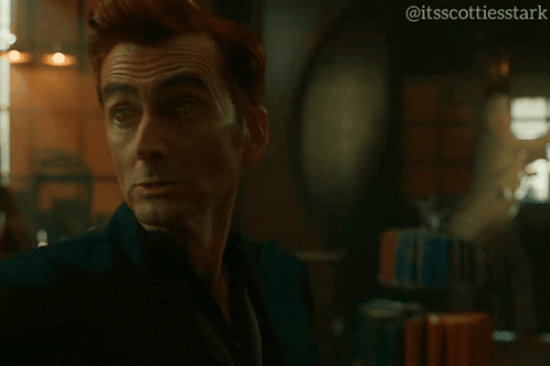 a man with red hair is screaming with the words ahh gabriel written below him