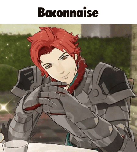A Man With Red Hair Is Sitting At A Table With A Cup Of Baconnaise In Front Of Him GIF