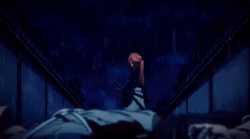 A Man With Red Hair Is Standing In The Rain With A Sword In His Hand GIF