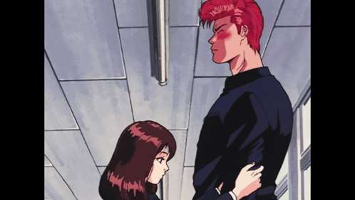 A Man With Red Hair Is Standing Next To A Girl GIF