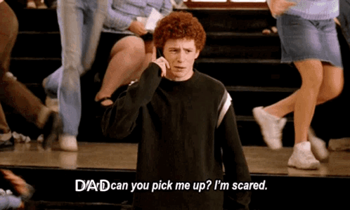 A Man With Red Hair Is Talking On A Cell Phone And Says " Dad Can You Pick Me Up? I 'M Scared " GIF