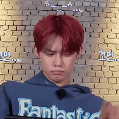 A Man With Red Hair Is Wearing A Blue Fantastic Hoodie GIF