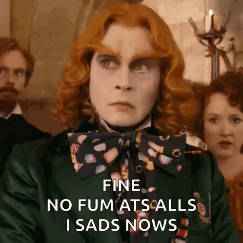 Man With Red Hair Wearing Green Jacket And Bow Tie GIF
