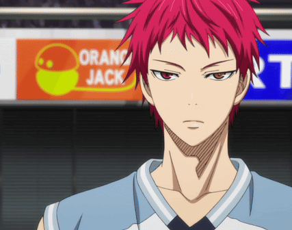 A Man With Red Hair Stands In Front Of A Sign That Says Orange Jack GIF