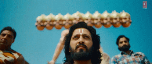 A Man With The Letter V On His Forehead Looks Up GIF