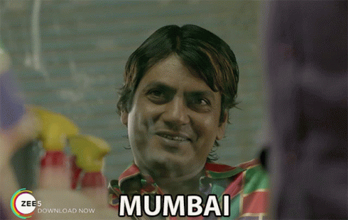A Man With The Word Mumbai Written On His Chest GIF