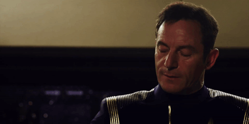 A Man With The Word You 'Re On The Top Of His Head GIF