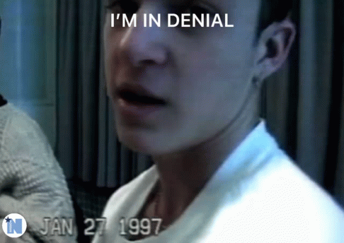 Man With I M In Denial On Face GIF