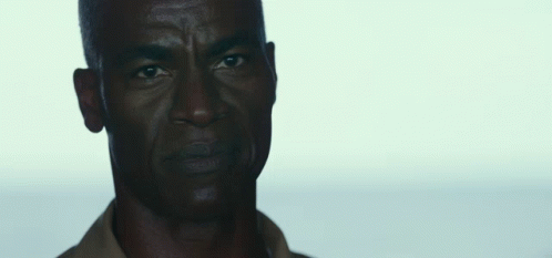 A Man With The Words Make Us Proud Written Below Him GIF