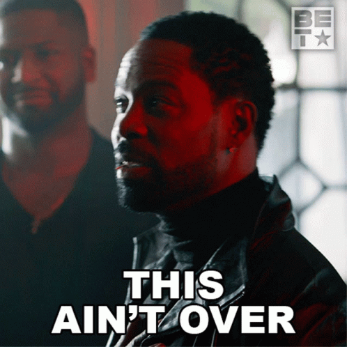 A Man With The Words This Ain 'T Over Written On His Face GIF