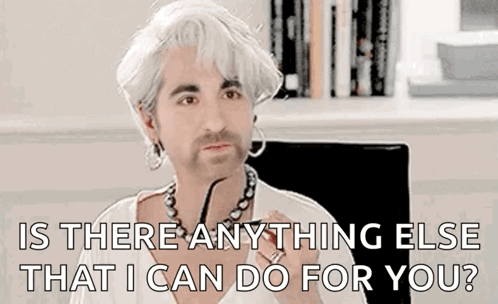 A Man With White Hair And A Beard Is Sitting In A Chair And Asking Is There Anything Else That I Can Do For You GIF