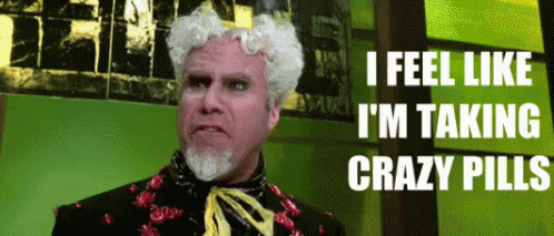 A Man With White Hair And A Beard Is Taking Crazy Pills GIF