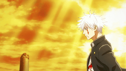 A Man With White Hair Is Standing In Front Of An Orange Sky GIF