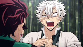 A Man With White Hair Is Talking To Another Man GIF