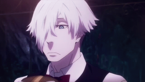 A Man With White Hair Is Wearing A Bow Tie And Vest GIF