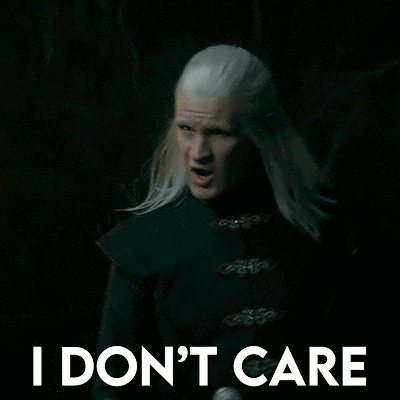 A Man With White Hair Says I Don T Care GIF