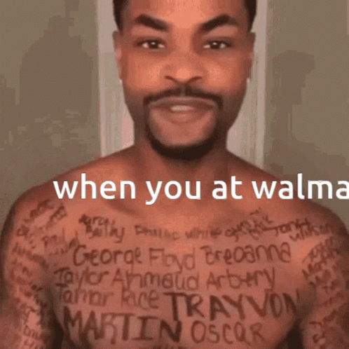 A Man Without A Shirt Has A Lot Of Tattoos On His Chest Including The Name Martin Oscar GIF