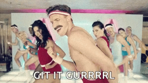 A Man Without A Shirt Is Dancing In Front Of A Group Of People With The Words Git It Gurrrl Written On The Bottom GIF