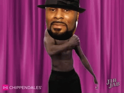 A Man Without A Shirt Is Dancing In Front Of A Pink Curtain With His Head On His Shoulder . GIF