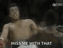 A Man Without A Shirt Is In A Boxing Ring With The Words `` Miss Me With That '' Written Next To Him . GIF