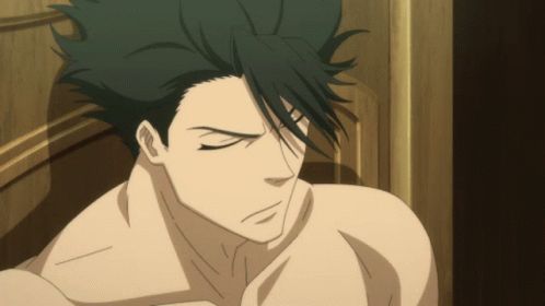 A Man Without A Shirt Is Looking Down With A Serious Look On His Face GIF