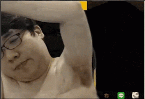 A Man Without A Shirt Is On A Video Call With A Green Line Icon In The Corner GIF