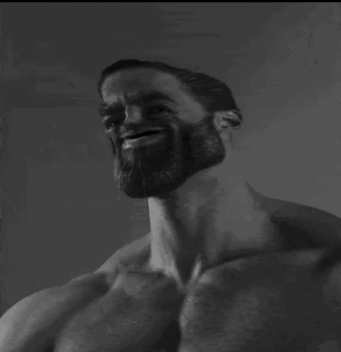 A Man Without A Shirt Is Reading A Book With Skulls On The Spine GIF