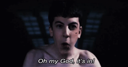 A Man Without A Shirt Is Saying Oh My God It 'S In GIF