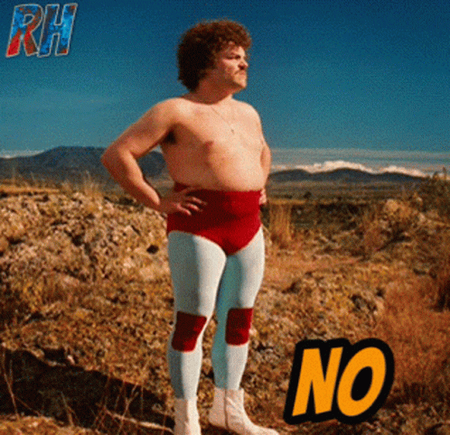 A Man Without A Shirt Is Standing In A Field With A No Sign GIF