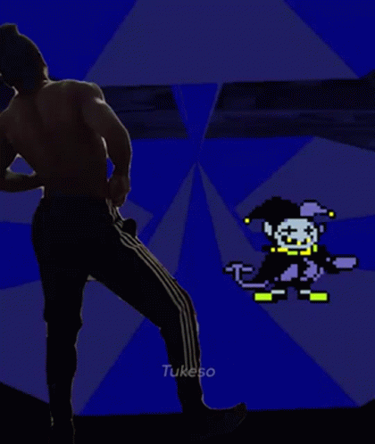 A Man Without A Shirt Is Standing In Front Of A Pixelated Clown . GIF
