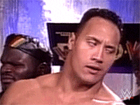 A Man Without A Shirt Is Standing In Front Of A Sign That Says W. GIF