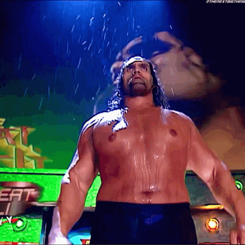 a man without a shirt is standing in the rain with the next thing written on the bottom right