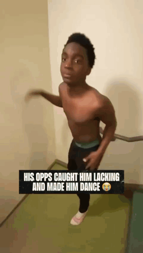 A Man Without A Shirt Is Standing On A Staircase With The Caption His Opps Caught Him Lacking And Made Him Dance . GIF