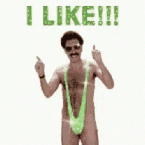 A Man Without A Shirt Is Wearing A Green Thong And Giving A Middle Finger . GIF