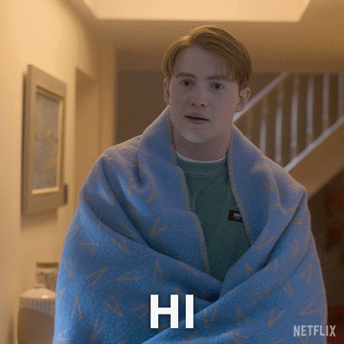 A Man Wrapped In A Blue Blanket With The Word Hi Written On It GIF