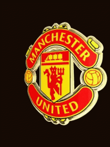 A Manchester United Emblem With A Lion And A Ball GIF