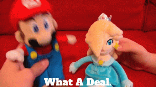 A Mario And Rosalina Stuffed Animal Are Being Held By A Person GIF