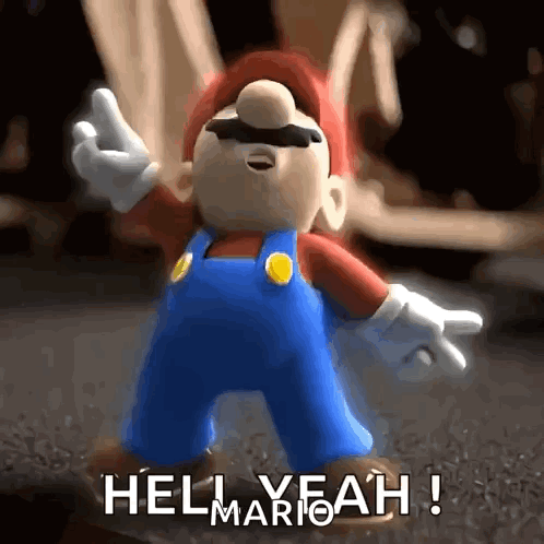 A Mario Figurine Says Hell Yeah In A GIF